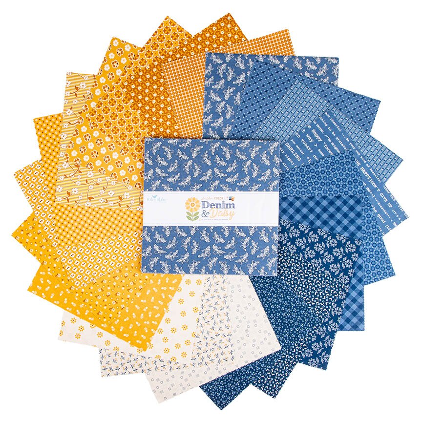 Denim & Daisy 10 inch Stacker by Lori Holt fanned out – denim blue, golden yellow and cream daisy, plaid and text print squares