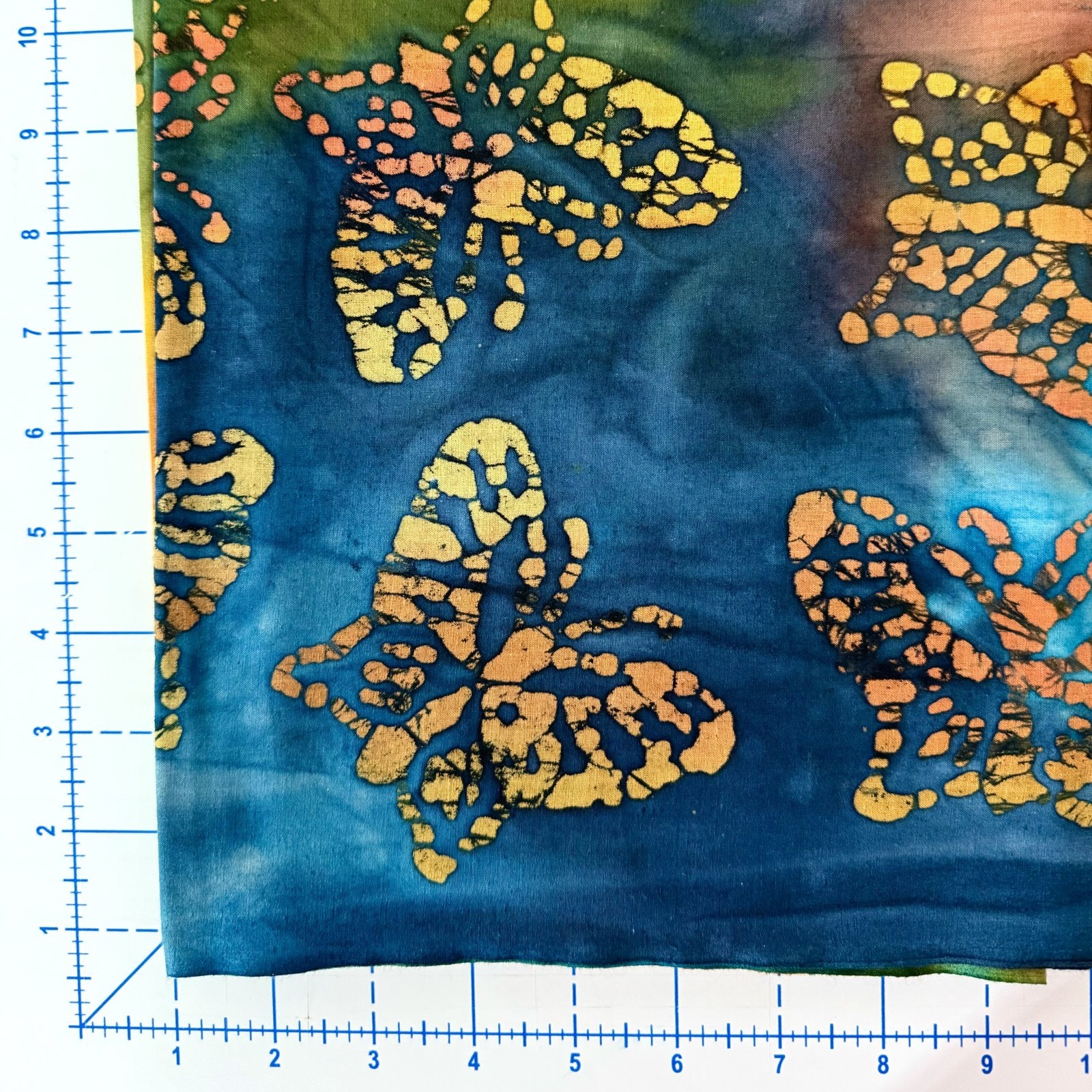 Quilters Batiks Orange butterflies