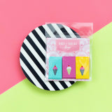 Pack of colorful ice cream-themed woven tags on a black and white striped background with a pink and green geometric pattern.